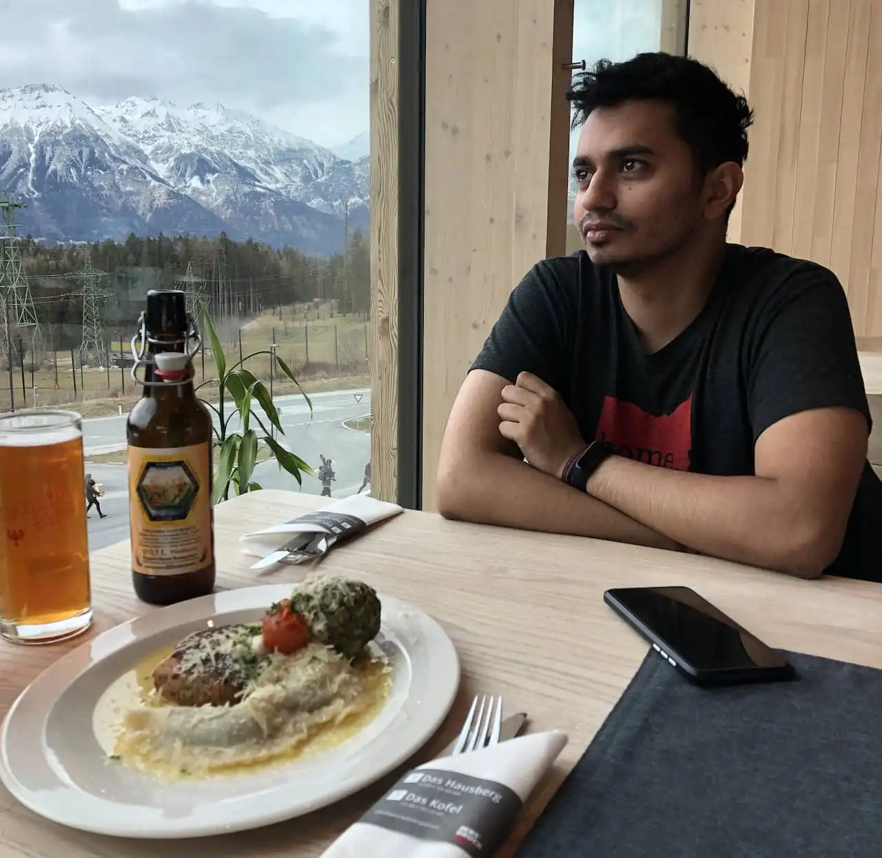 Sree enjoying a nice meal after skiing in the mountains of Austria